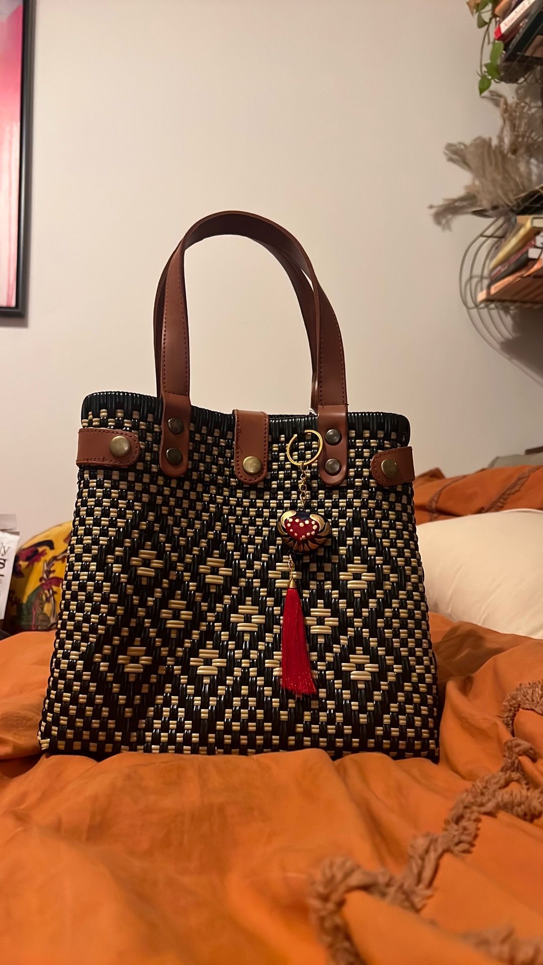 Woven bag with leather handles
