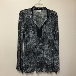 Women’s MKM DESIGNES 100% polyester black & white print long sleeve pull over stretch top with bell sleeves