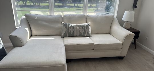 L shaped sofa with end table