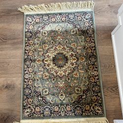 Small Persian rug