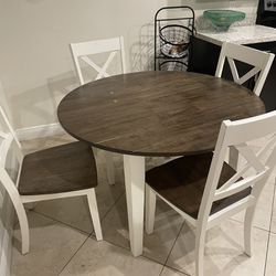 Brown Round Breakfast Table With 4 Chairs for $250