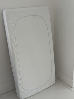 FREE baby crib mattress with removable cover.