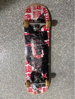 DGK red graphics skateboard