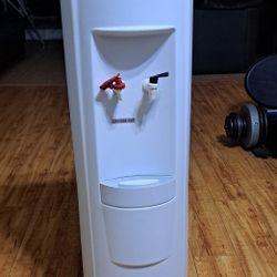 Top Loading Hot/Cold Water Cooler. In New Condition..