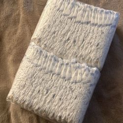 NEW pack of size 1 HUGGIES diapers 