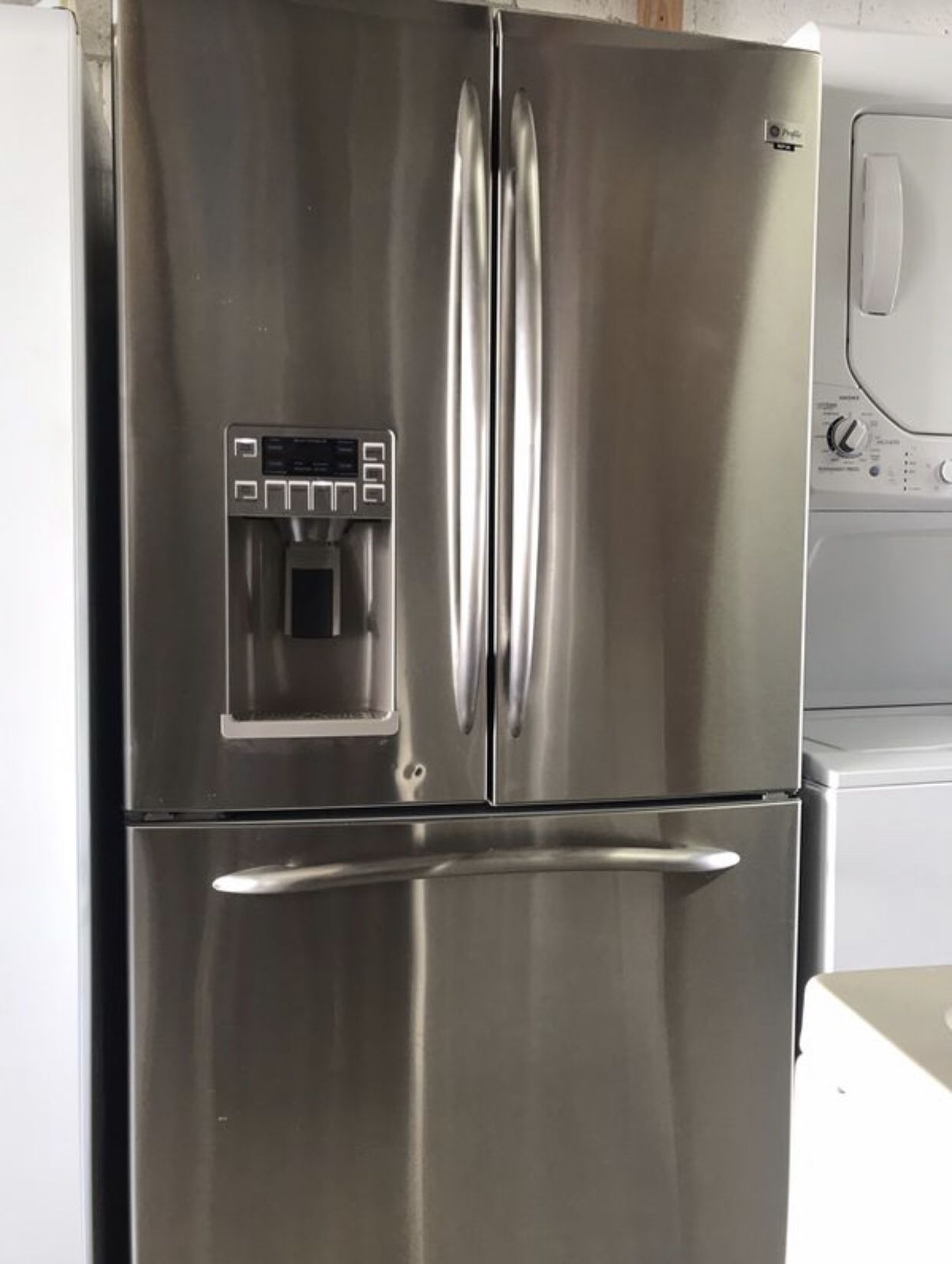 Ge stainless steel refrigerator 36” wide working perfect and 4 months warranty. No ice maker. Immediate delivery service available