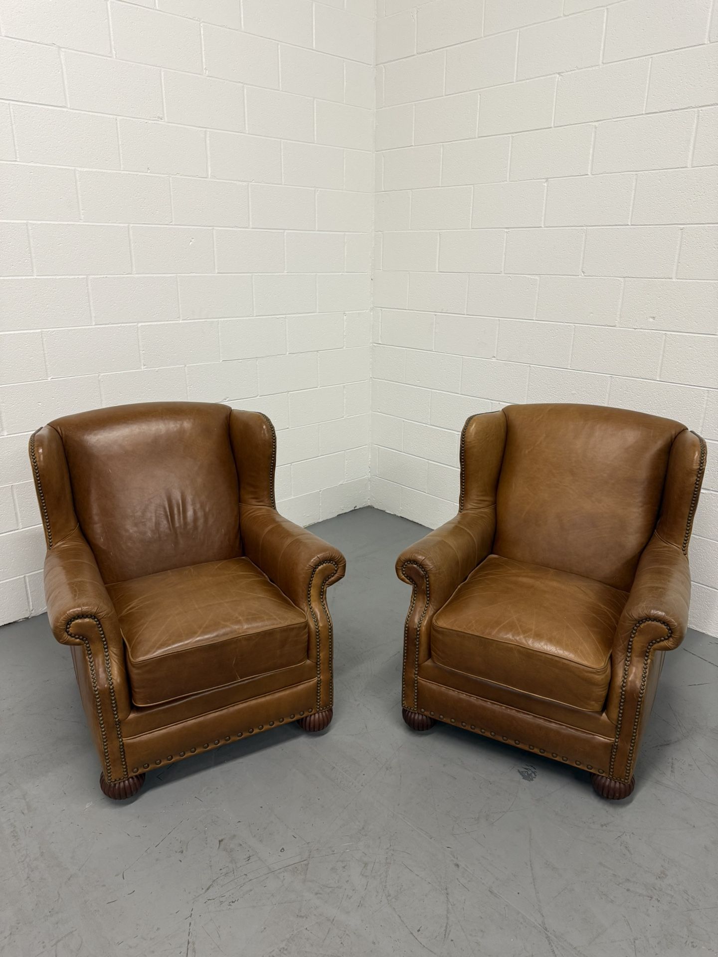 Walter E. Smithe Leather Wingback Chairs & Ottomans-Delivery Available