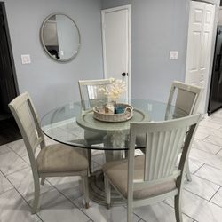 Dining table and chairs with matching mirror