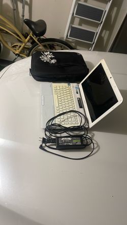 Laptop with charger and laptop bag