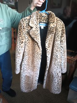 Fake fir coats one a leopard one a black and silver fur new , perfect , still tagged each three hundred dollars