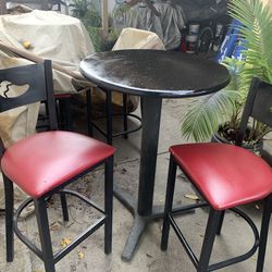 Tall Black Table  With3  Red Cushion Chairs 