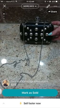 Skull black studded clutch purse