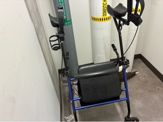 Slender stand up folding rollator walker