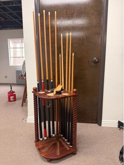 Pool table cue stand and cues