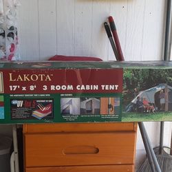 Cabin tent sleeps 7  people center height Cabin tent sleeps 7  people center height 7ft brand new in box never used worth $400.00 in store a OBO n
