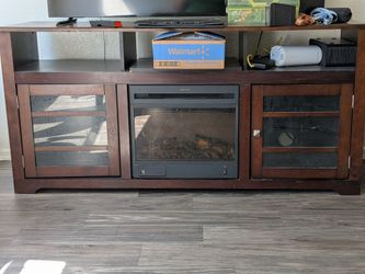 Free tv stand with fireplace