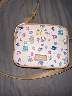 Sanrio purse and Winnie the Pooh each $20