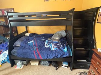 Black wooden twin over full bunk bed