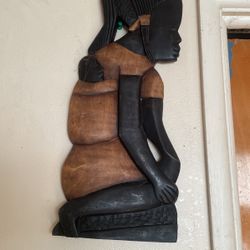 hand-carved African wooden wall plaque 