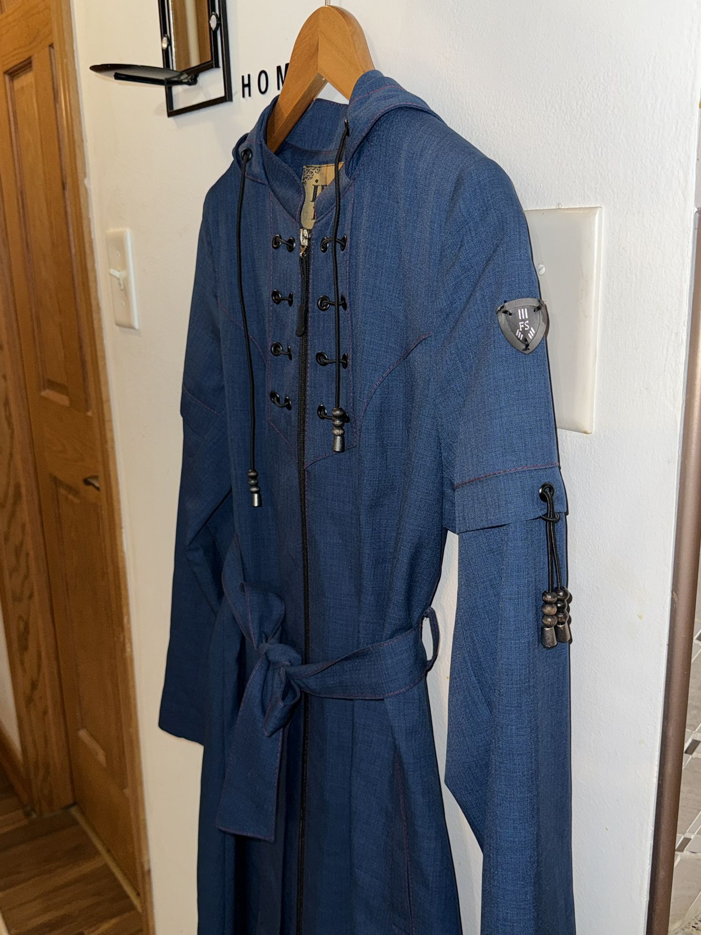 A dress with a full-length zipper; it looks very elegant.