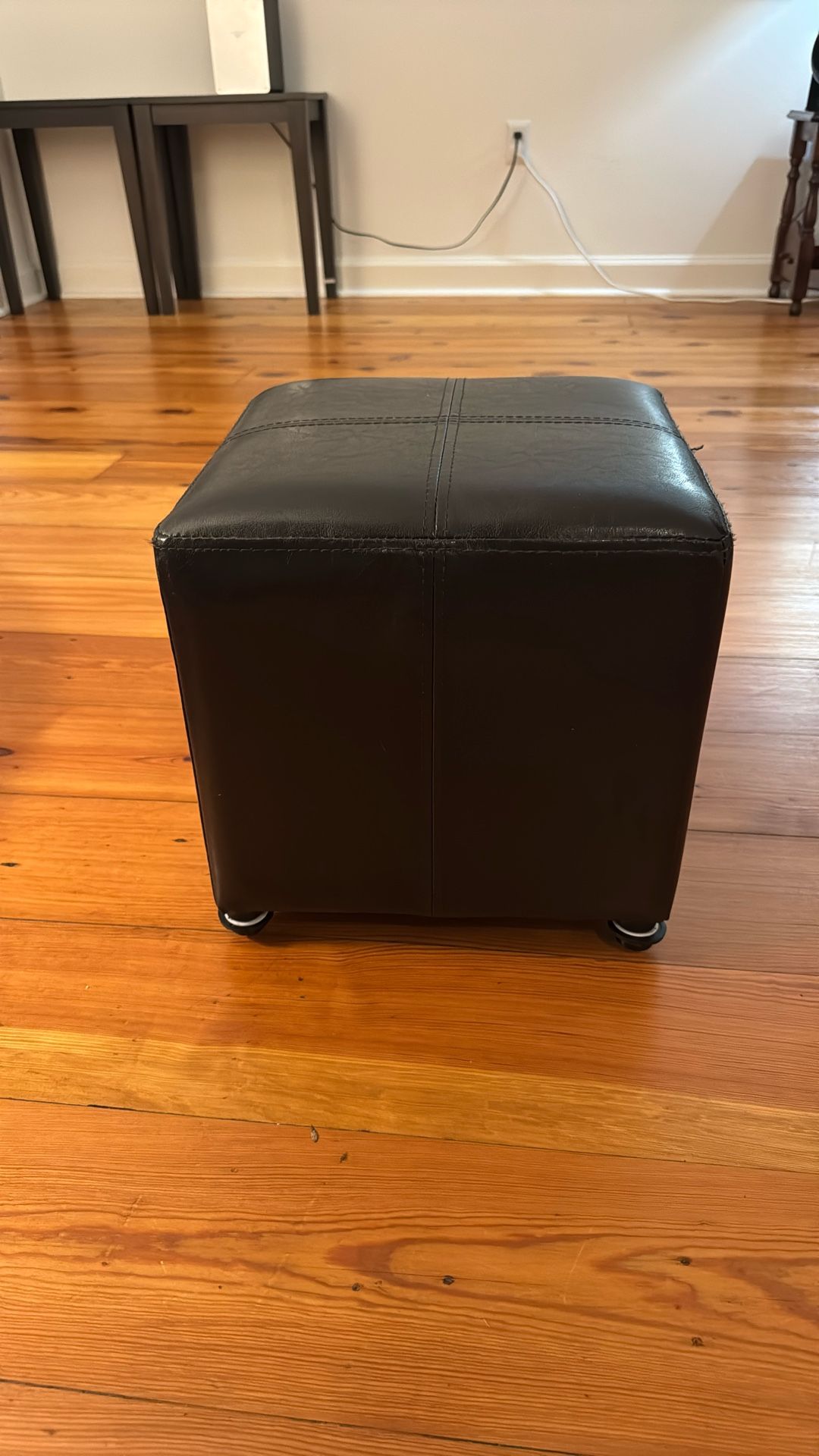 Small Faux Leather Ottoman with wheels