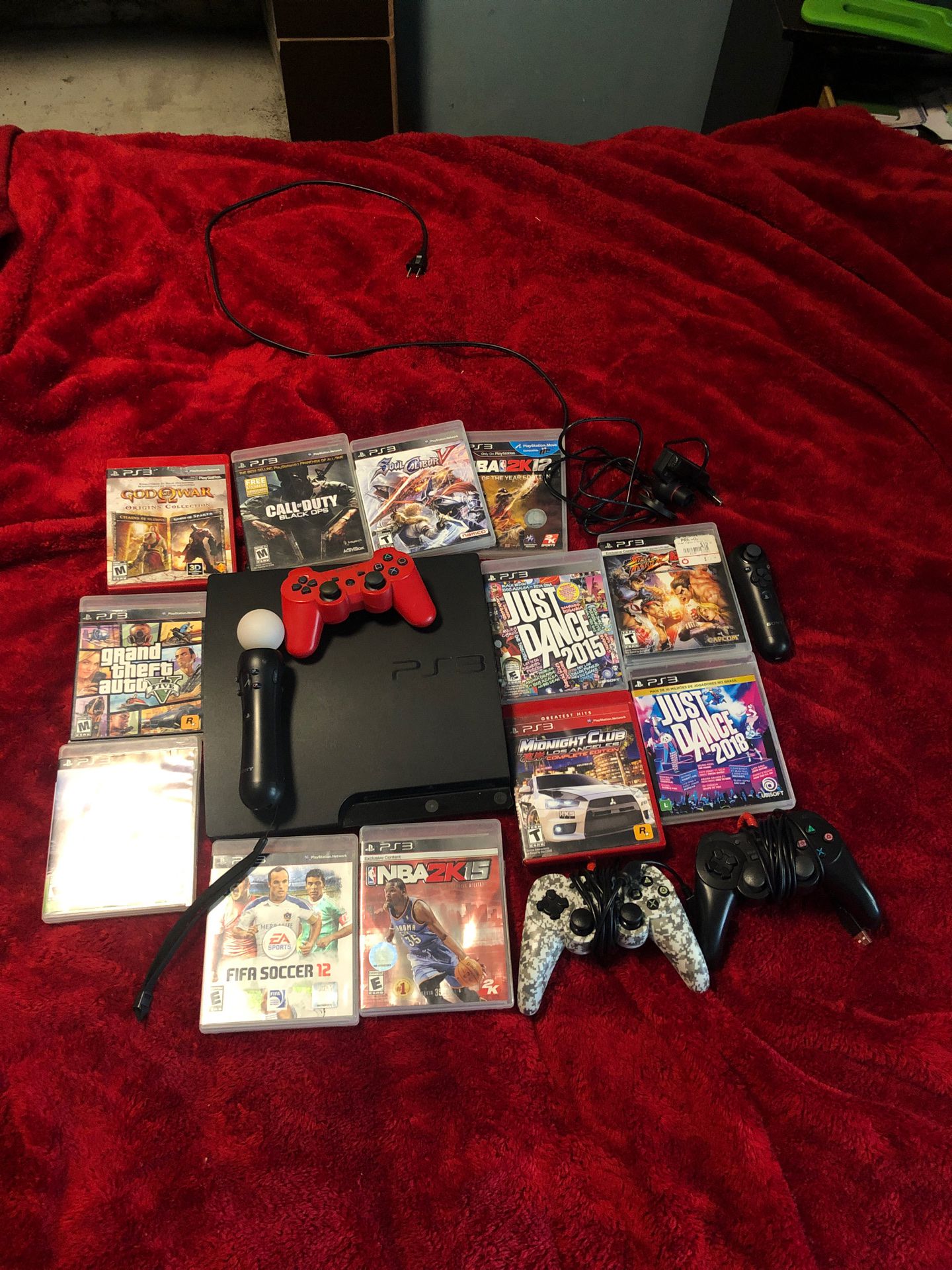 I’m selling my PS3 with games, camera, motion control and 4 controls