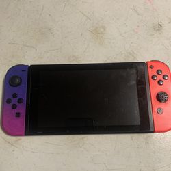 Nintendo Switch With Purple And Red Joy cons