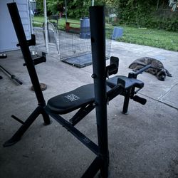 Adjustable Bench With Leg Curl , And EZ Bar With. X2 22 Pound Weights 