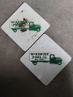 Vintage McKenzie Fuel Company metal painted insulated pot holders, Tacoma