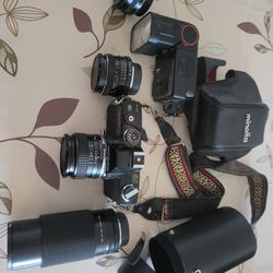 Minolta 35mm Camera And Accessories 