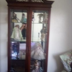 Wooden Doll Or China Cabinit