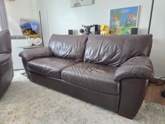 Brown leather recliner and sofa