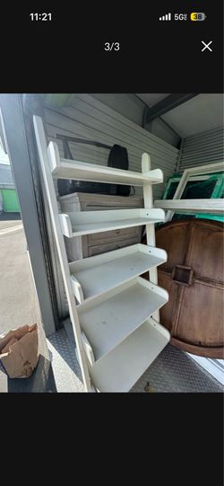 Pottery Barn Studio ladder shelves in antique white