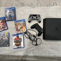 Play station 4 (with 2 Controllers And 5 Games)