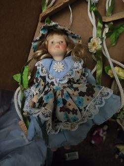 3 hanging dolls