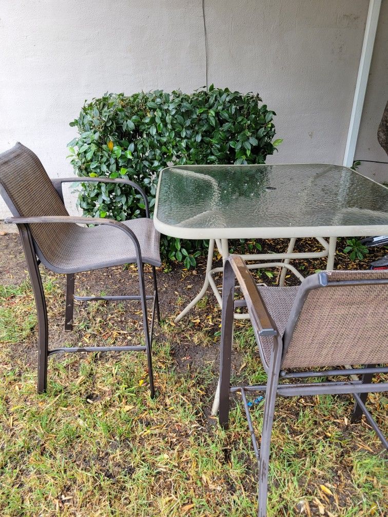 Glass Top Patio Table And 4 Tall Chairs