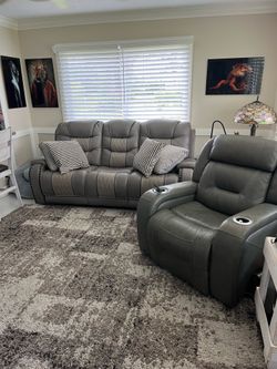 Leather power reclining couch and power recliner
