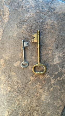 When large brass skeleton key over 5 inches and smaller skeleton, both unique