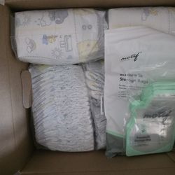 Diapers Newborn, Size 1, And Breast Milk Bags 