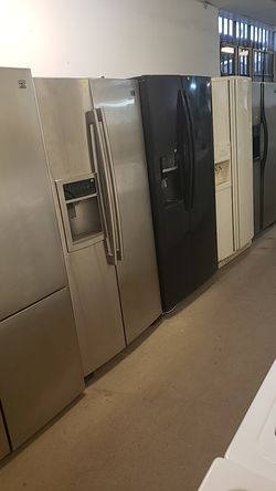 Side by side refrigerators