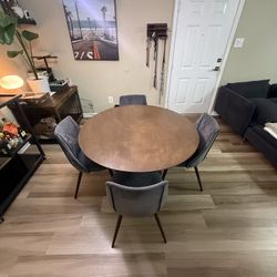 Round Wood Table With 4 Grey Chairs 