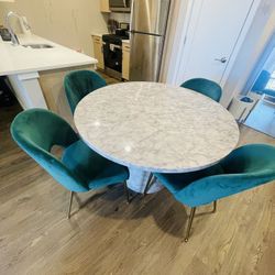 Title: Modern Marble Dining Table Set with 4 Emerald Green Velvet Chairs – Stunning Look!