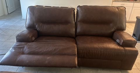 Leather recliner over sized loveseat