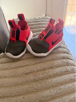 Red Nike baby shoes
