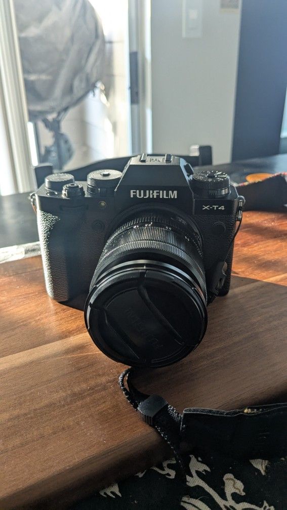 Fuji x-t4 with XF 18-55mm f/2.8-4 (plus batteries and charger)