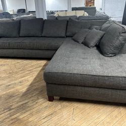 Delivery available large chaise sectional couch