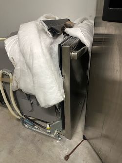 Table, microwave and dishwasher