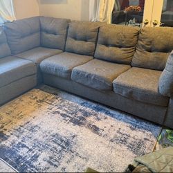 L Shaped Gray Couch With Pull Out Bed 