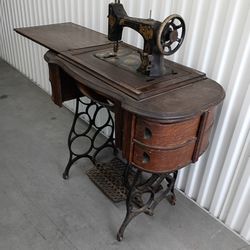 Antique Sewing Machine with working Foot Pedal. Collector's Item for restoration. Accessories included 
