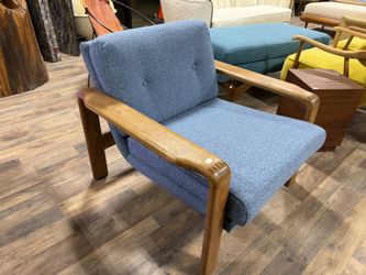 Mid century Danish teak lounge chair with new upholstery